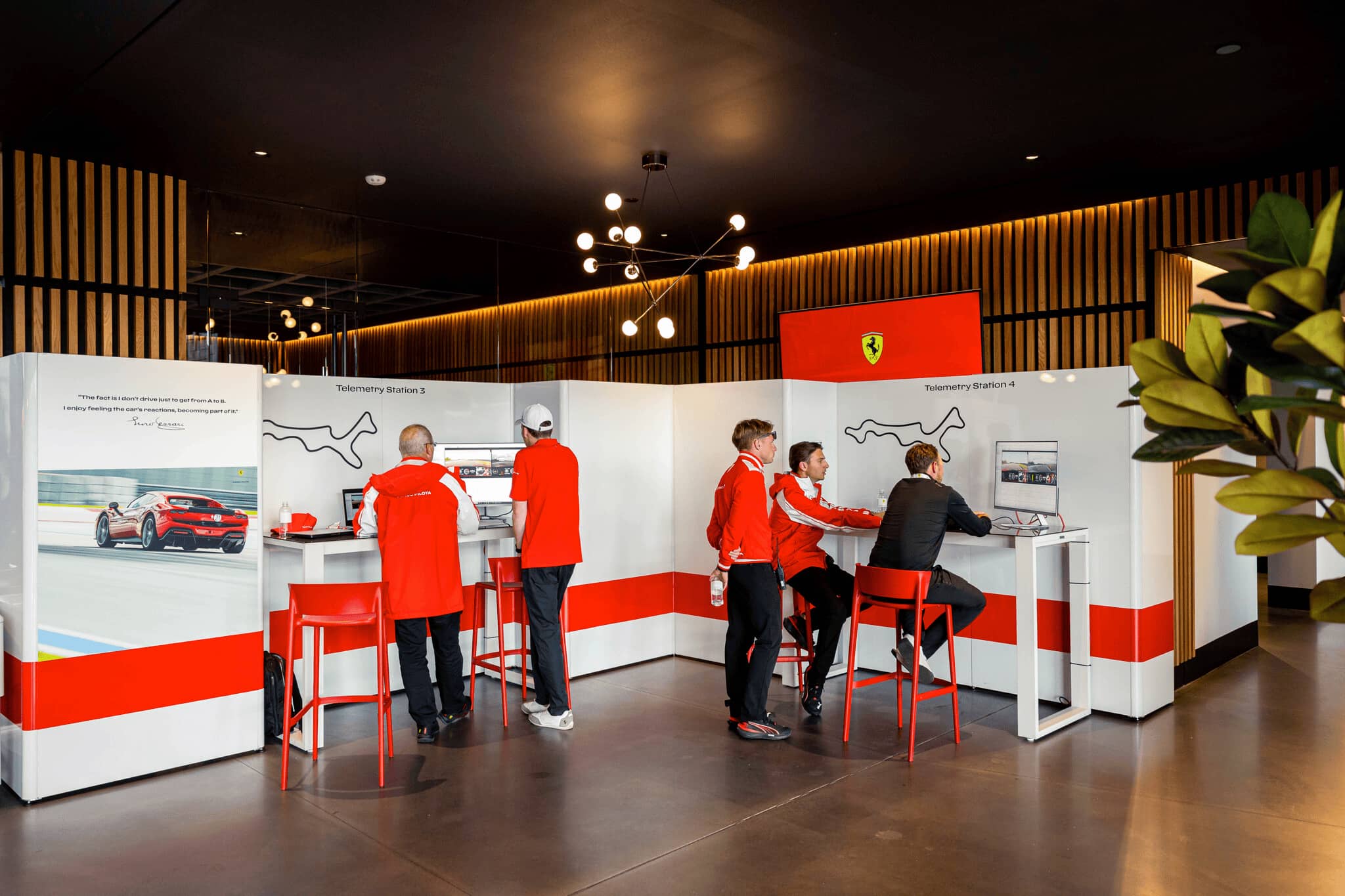 People working at Ferrari Telemetry Stations