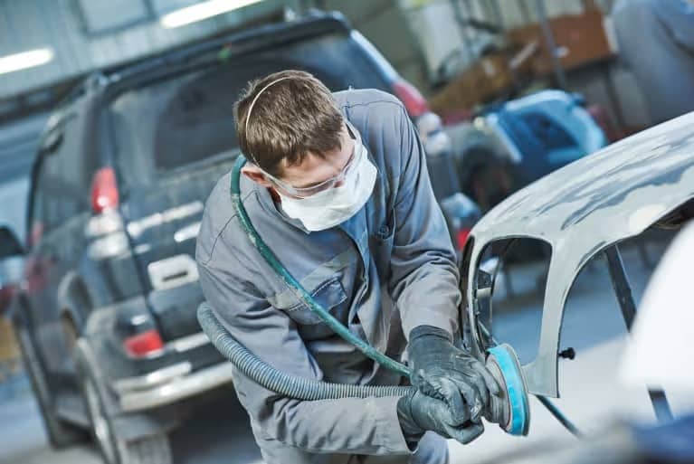 Sanding down vehicle part